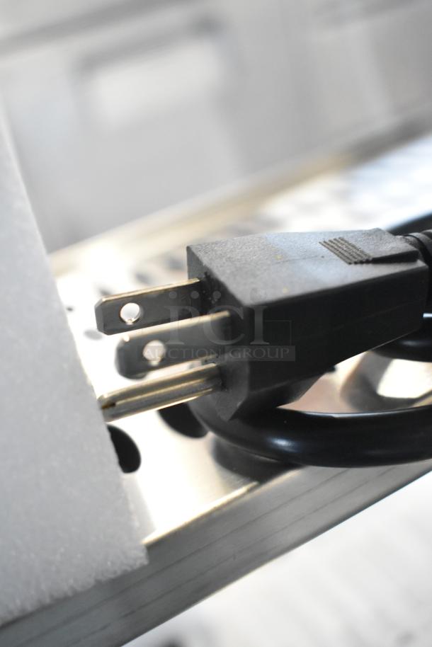 Black power plug and cord for Vollrath RDE8160 display cabinet, showing standard two-prong configuration. 