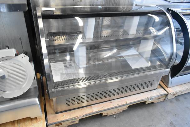 BRAND NEW Vollrath RDE7148 Stainless Steel Commercial Countertop Refrigerated Display Case. 120V, one phase, minor scratches.