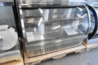 BRAND NEW Vollrath RDE7148 Stainless Steel Commercial Countertop Refrigerated Display Case. 120V, one phase, minor scratches.