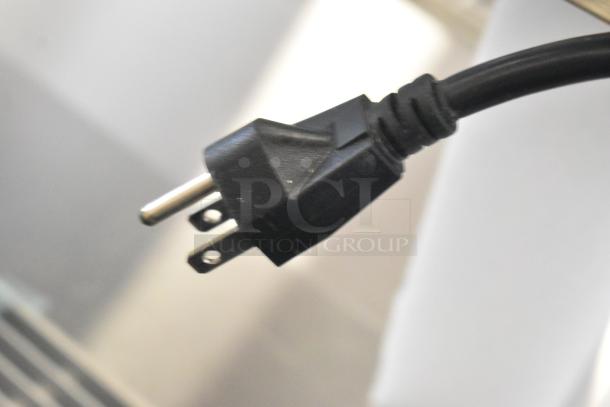 Close-up of a power plug on the Vollrath RDE7148 refrigerated display case. Brand new, 120 Volts, 1 Phase.