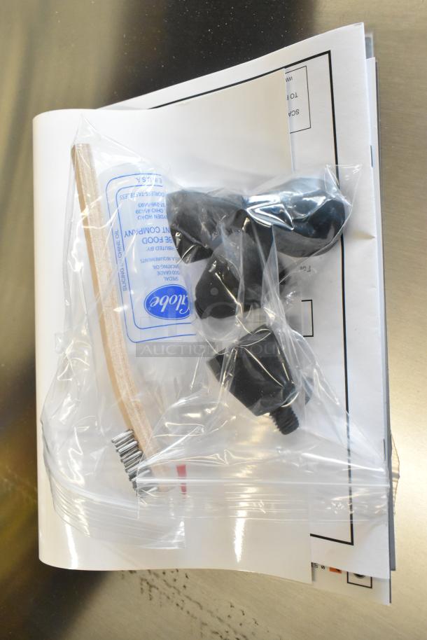 BRAND NEW 2018 Globe SG13A-07 stainless steel meat slicer accessories in packaging with manuals.