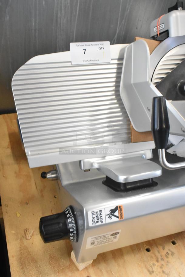 Brand new Globe SG13A-07 stainless steel meat slicer, countertop model with blade sharpener, 220V, 1 phase.