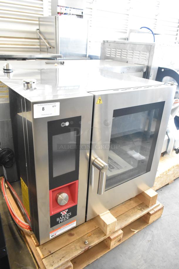 Brand new Bakers Pride AEHE061R stainless steel combi convection oven, 208V, 3-phase, with minor scratches, on a pallet.