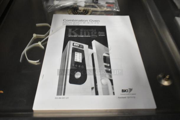 Brand new Bakers Pride AEHE061R stainless steel commercial combi convection oven, 208V, 3 phase, with manual.