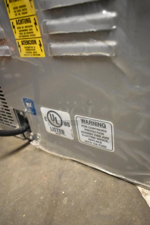 Necta Kolbalto espresso machine, stainless metallic finish, UL listed, warning label for 15A fuse. 208/250V, 1 Phase.