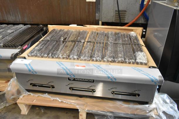 BRAND NEW Venancio CGG36 stainless steel charbroiler grill, natural gas, with visible factory wrap; slight scratch and dent condition.