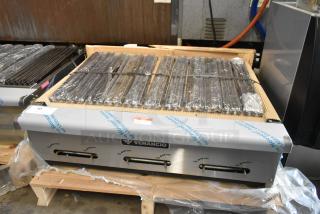 BRAND NEW Venancio CGG36 stainless steel charbroiler grill, natural gas, with visible factory wrap; slight scratch and dent condition.
