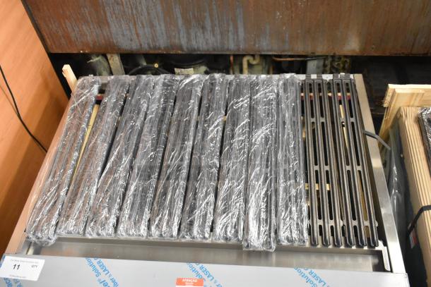 BRAND NEW SCRATCH AND DENT Venancio CGG36 stainless steel commercial countertop natural gas charbroiler grill in plastic wrapping.