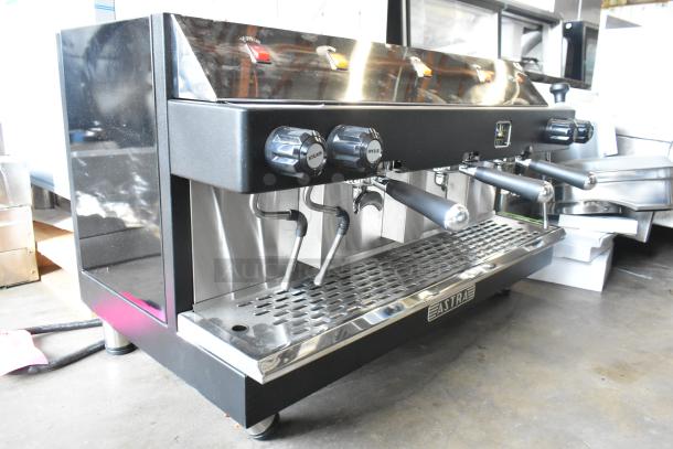 Brand new Astra 3S-018 stainless steel espresso machine, 3 group, 3 portafilters, 2 steam wands, scratch and dent condition.