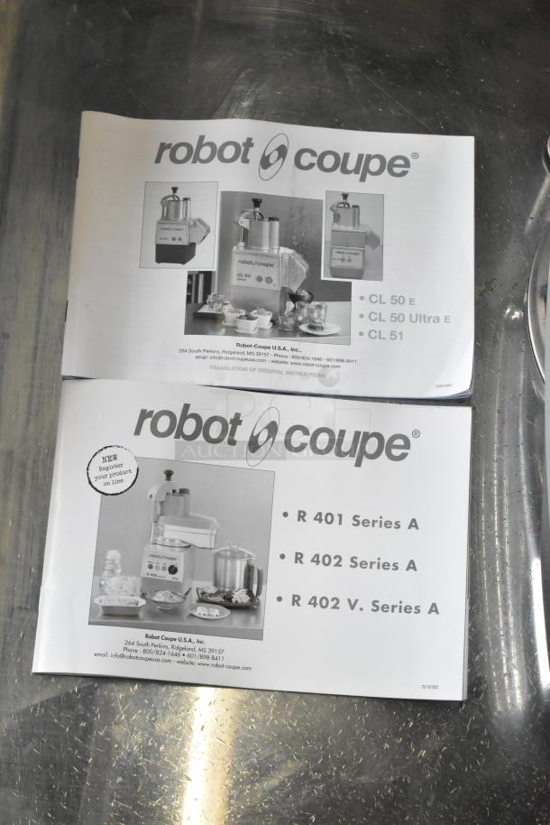 Brand new Robot Coupe R402 countertop food processor with bowl, continuous feed head, and various discs, 120V, 1 phase.
