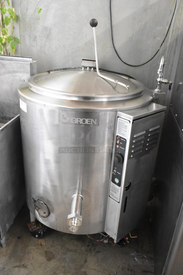 Groen AH-1E-40 stainless steel 40-gallon steam kettle, floor style with commercial casters, visible brand label, control panel.