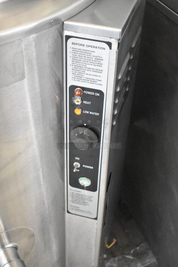 Groen AH-1E-40 stainless steel 40-gallon steam kettle with control panel and operation instructions, on commercial casters.