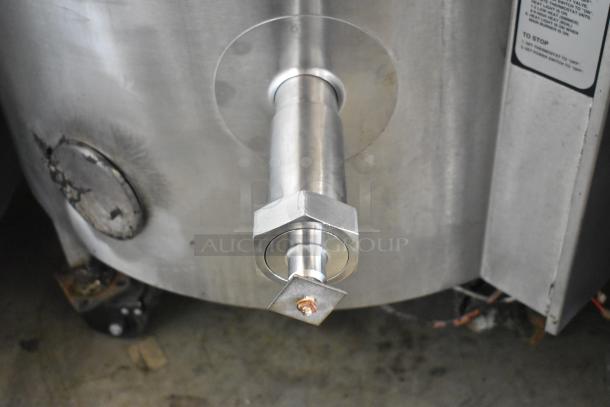 Groen AH-1E-40 40 Gallon Steam Kettle, stainless steel, floor style, commercial casters, visible spout, worn condition.