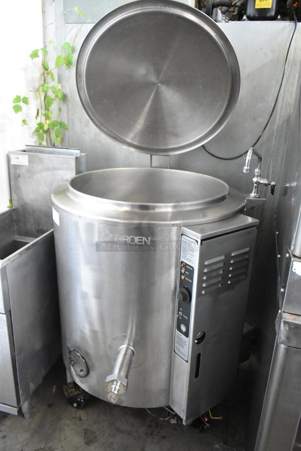 Groen AH-1E-40 stainless steel commercial 40-gallon steam kettle on casters, with lid open, in good condition.
