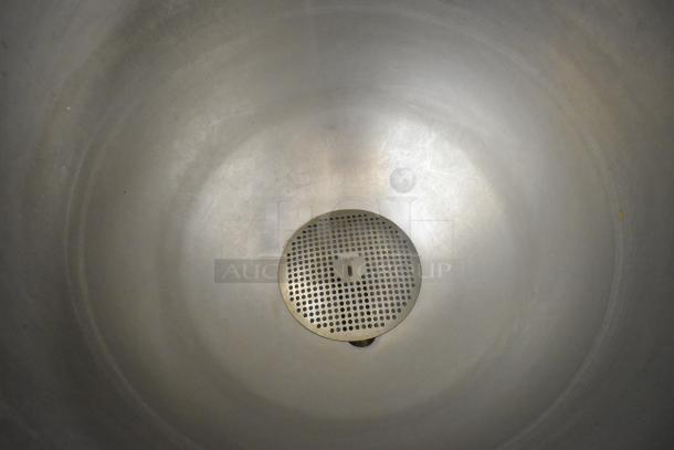 Groen AH-1E-40 steam kettle interior, stainless steel, 40-gallon capacity, showing perforated drain. Ideal for commercial use.