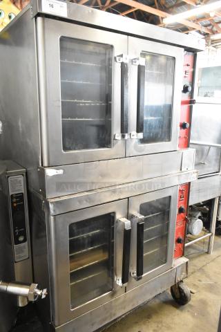 2 Vulcan VC4CD stainless steel convection ovens, with view-through doors, metal racks, thermostatic controls, on casters.