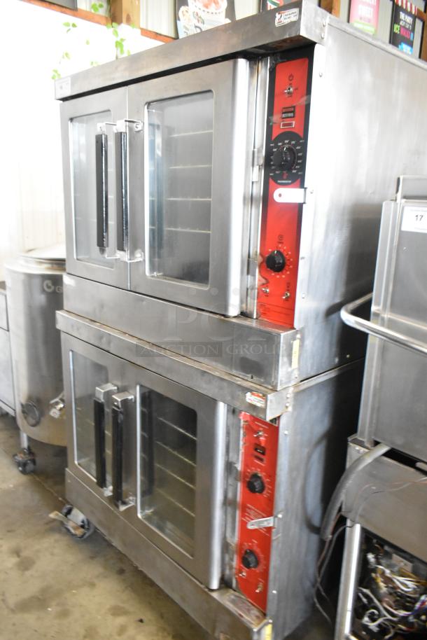 Vulcan VC4CD stainless steel convection oven with view-through doors, metal racks, thermostatic controls, on commercial casters.