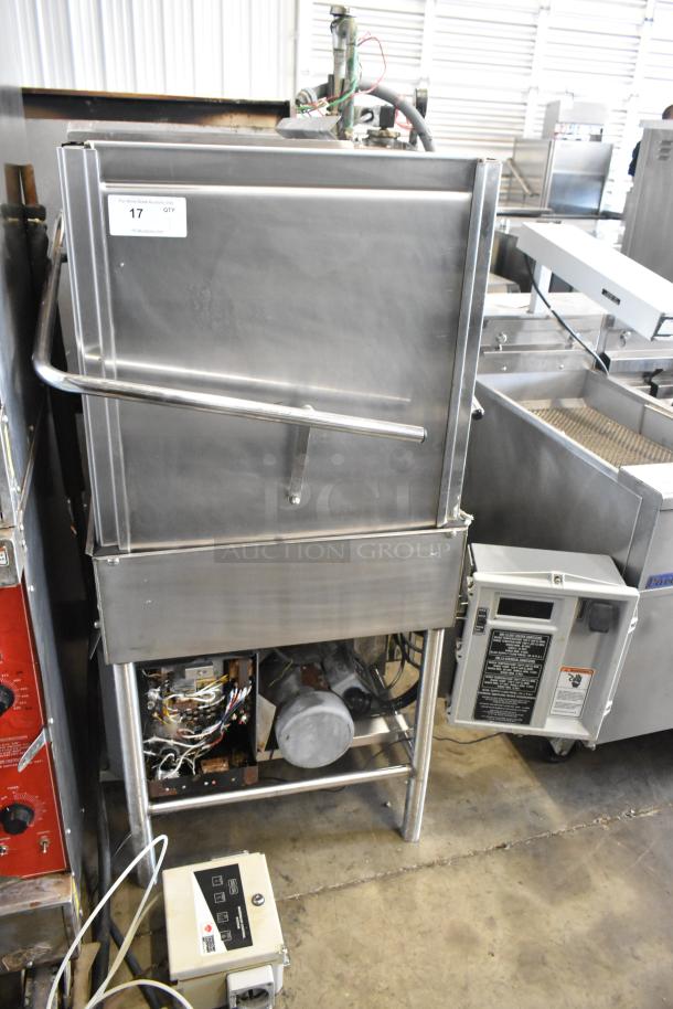 Stainless steel commercial corner pass-through dishwasher, visible wiring, control panel. Auction tag indicates quantity.