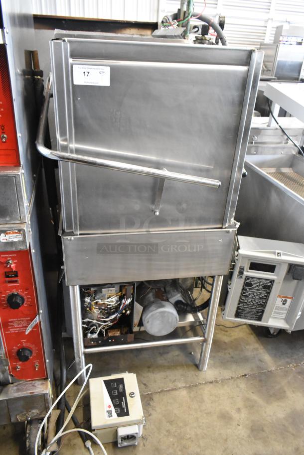 Stainless steel commercial corner pass-through dishwasher, showing control panel and exposed wiring, used condition.