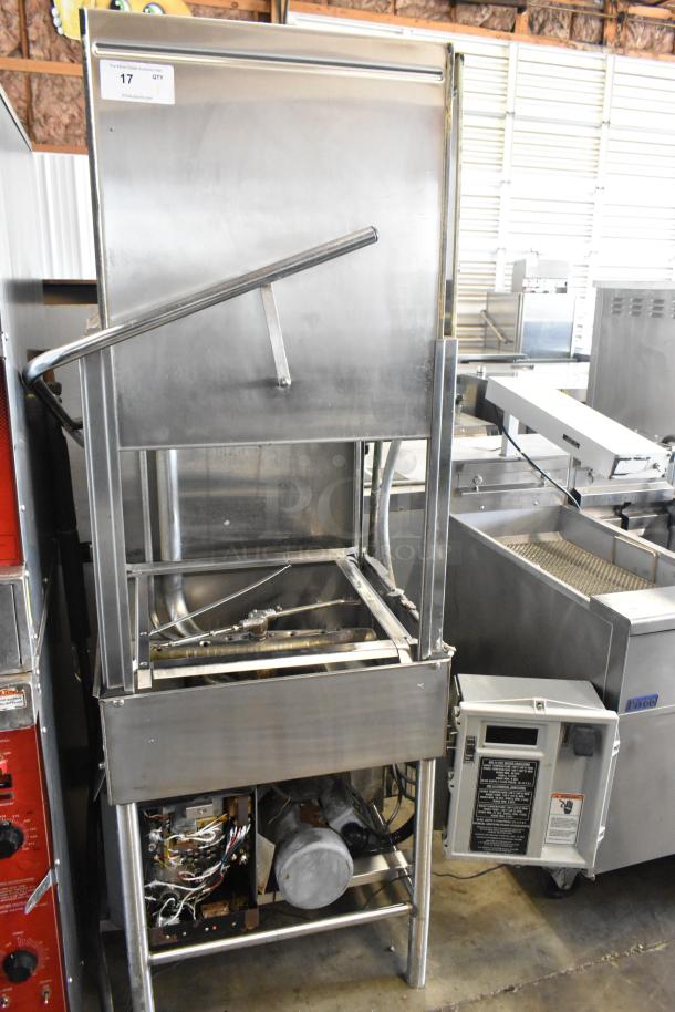 Stainless steel commercial corner pass through dishwasher, large capacity, open panel showing internal components, industrial setting.