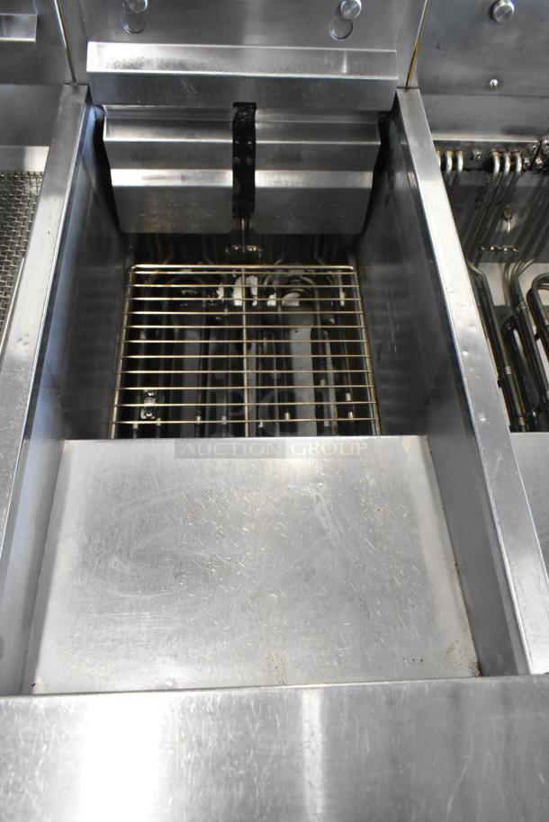 2019 Pitco Frialator SE14 stainless steel 2-bay fryer with left side dumping station, warming strip, filtration, on casters.
