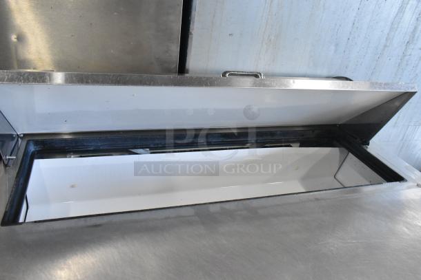 True TSSU-48-12 stainless steel prep table, open lid view, bain marie mega top, on commercial casters, 115V, 1 phase.