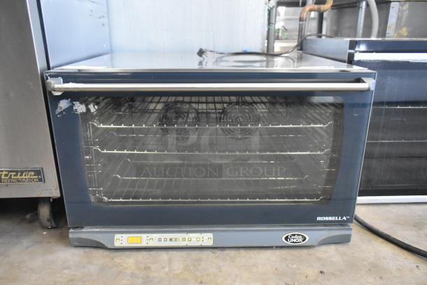 Cadco Unox XAF195 Rossella stainless steel convection oven, full-size, electric, visible controls, and racks, 230-400 volts.