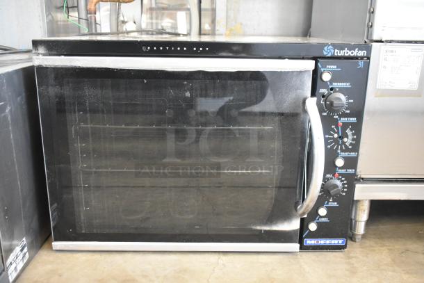 Moffat E311 Turbofan 31 stainless steel convection oven, electric, 220-240V, countertop model, controls visible.