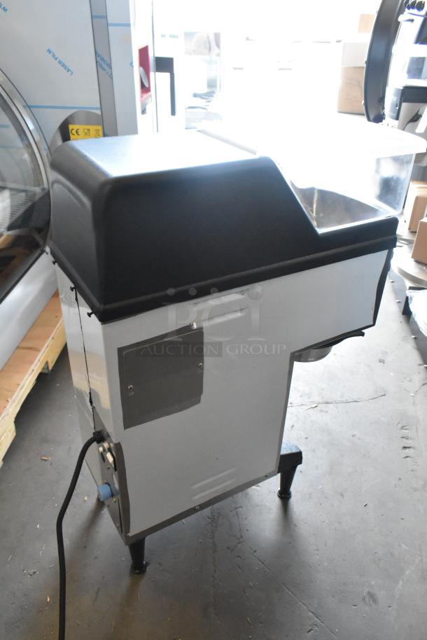 Grindmaster Grind N Brew stainless steel commercial coffee grinder and maker with hot water dispenser, metal brew basket.