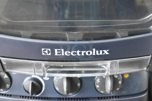 Brand new Electrolux OTS100 countertop mini combi steamer, metal finish, 110V, 1-phase, scratch and dent condition.
