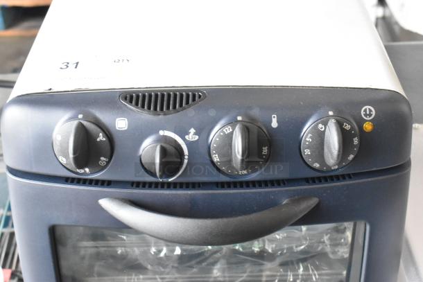 BRAND NEW Electrolux OTS100 Mini Combi Steamer, 110V, 1 Phase. Features manual controls, metal body. Scratch and dent condition.
