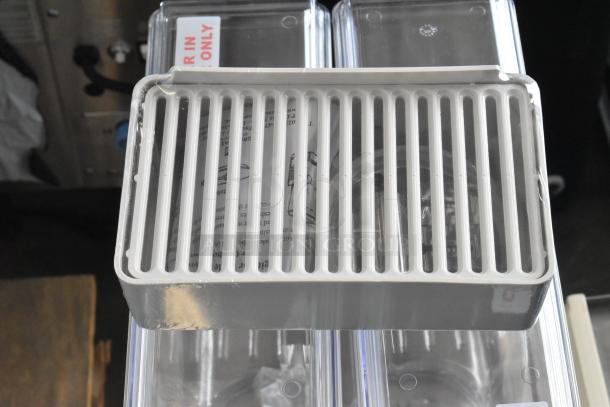 Crathco E27/E29-4 beverage machine, new scratch and dent condition, 2 hoppers, metal countertop design, 115V, 1 phase.