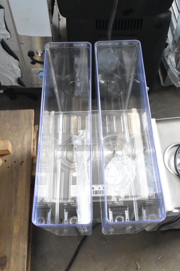 Brand new Crathco E27/E29-4 metal beverage machine with 2 hoppers. 115V, 1 Phase. Scratch and dent condition.
