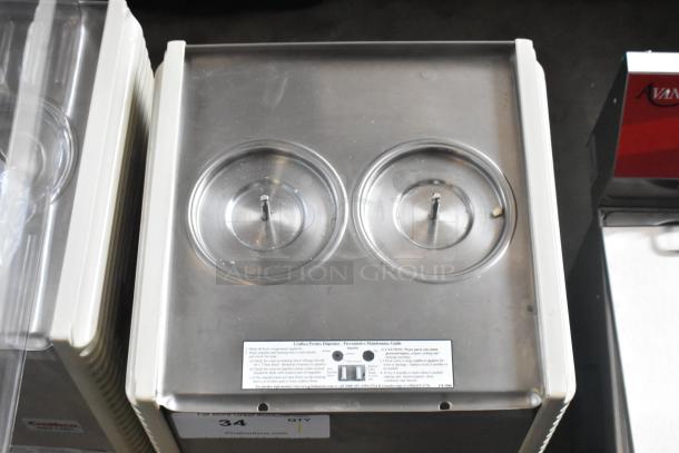 Crathco E27/E29-4 metal commercial beverage machine base, new with scratches and dents. Two hoppers, 115V, 1 phase.