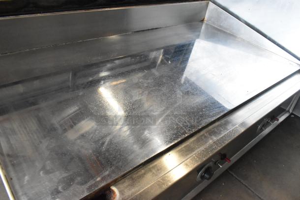 Keating Miraclean ABX3D stainless steel gas griddle with chrome top, thermostatic controls, and minor surface wear.