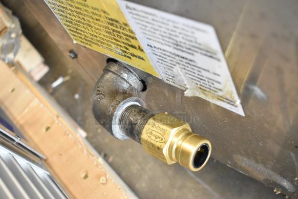 Keating Miraclean ABX3D griddle connection with label. Stainless steel, gas, commercial use.