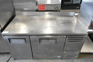 2023 True TWT-60-32F-HC stainless steel 2-door work top freezer, 115 volts, excellent condition.