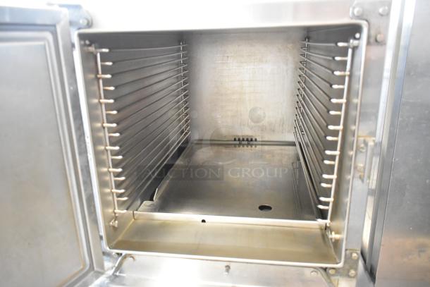 Southbend R2 RapidSteam stainless steel commercial steam cabinet interior; features multiple rack slots, clean condition.