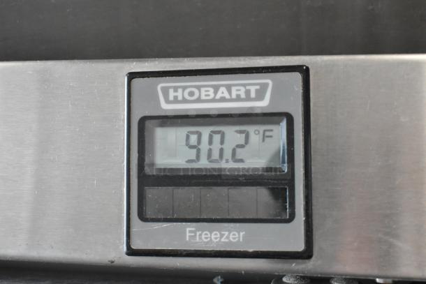 Hobart QF2 stainless steel commercial freezer display showing 90.2°F. Visible Hobart logo on digital control panel.
