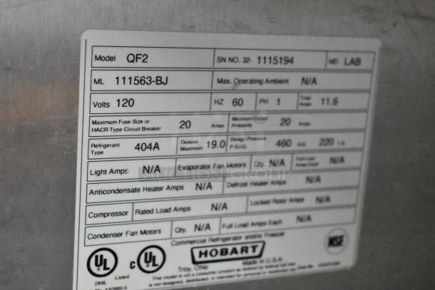 Label on 2024 Hobart QF2 Stainless Steel Commercial 2 Door Reach In Freezer, showing model QF2, 120 volts, refrigerant 404A.