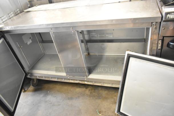 Beverage Air stainless steel 2-door undercounter cooler on commercial casters, 115V, used condition, interior view.