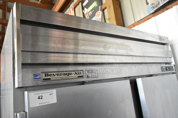Stainless steel Beverage Air E Series 2-door reach-in cooler on casters. Note: left door does not stay closed.