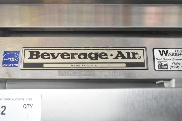 Beverage Air E Series stainless steel 2-door reach-in cooler. Commercial casters. Energy Star label. Left door faulty.