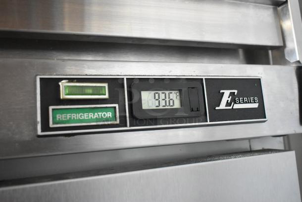 Beverage Air E Series stainless steel commercial cooler, 2-door, on casters. Left door faulty. Temperature display reads 83.6°F.
