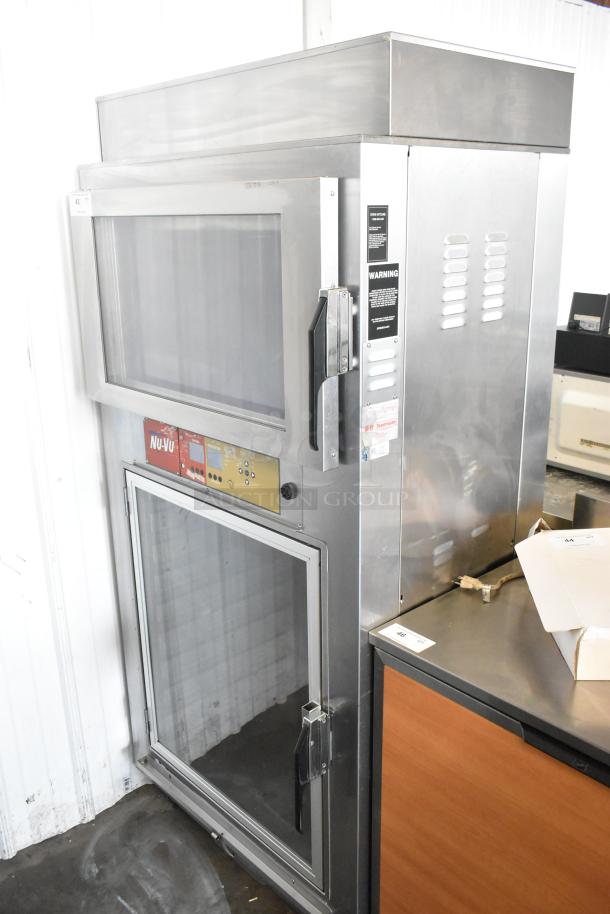 Nu Vu SUB-123P stainless steel commercial oven proofer, electric, on casters, model markings and warning labels visible.