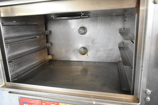 Nu Vu SUB-123P stainless steel commercial oven proofer interior; in used condition, electric, on commercial casters, 208V, 3 phase.