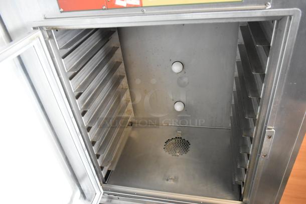 Nu Vu SUB-123P stainless steel commercial electric oven proofer with rack slots, clean inside, 208V, 3-phase, on casters.