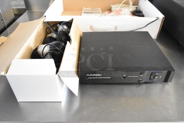 Floureon D2316Y Digital Video Recorder in good condition, with cables in box, front panel controls visible.