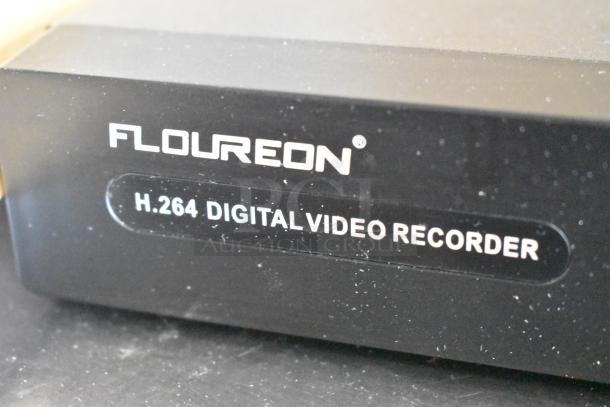Floureon D2316Y Digital Video Recorder with H.264 encoding. Black casing, good condition, model and make visible.