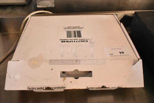 Floureon D2316Y Digital Video Recorder in a sealed white box. Box shows signs of wear and a barcode label.